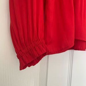 Red silky blouse